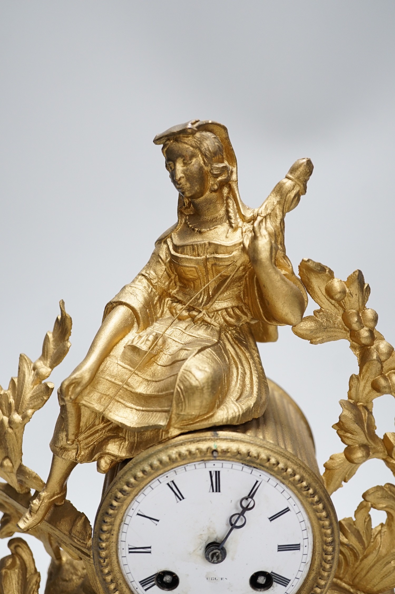 A French gilt metal figural mantel clock, 33cm high